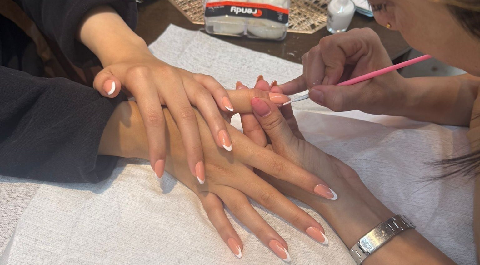 Nail artist at Remal Beauty Salon, Zinj, Muḥāfaẓat Al-ʿāṣimah, BH creates a perfect manicure.