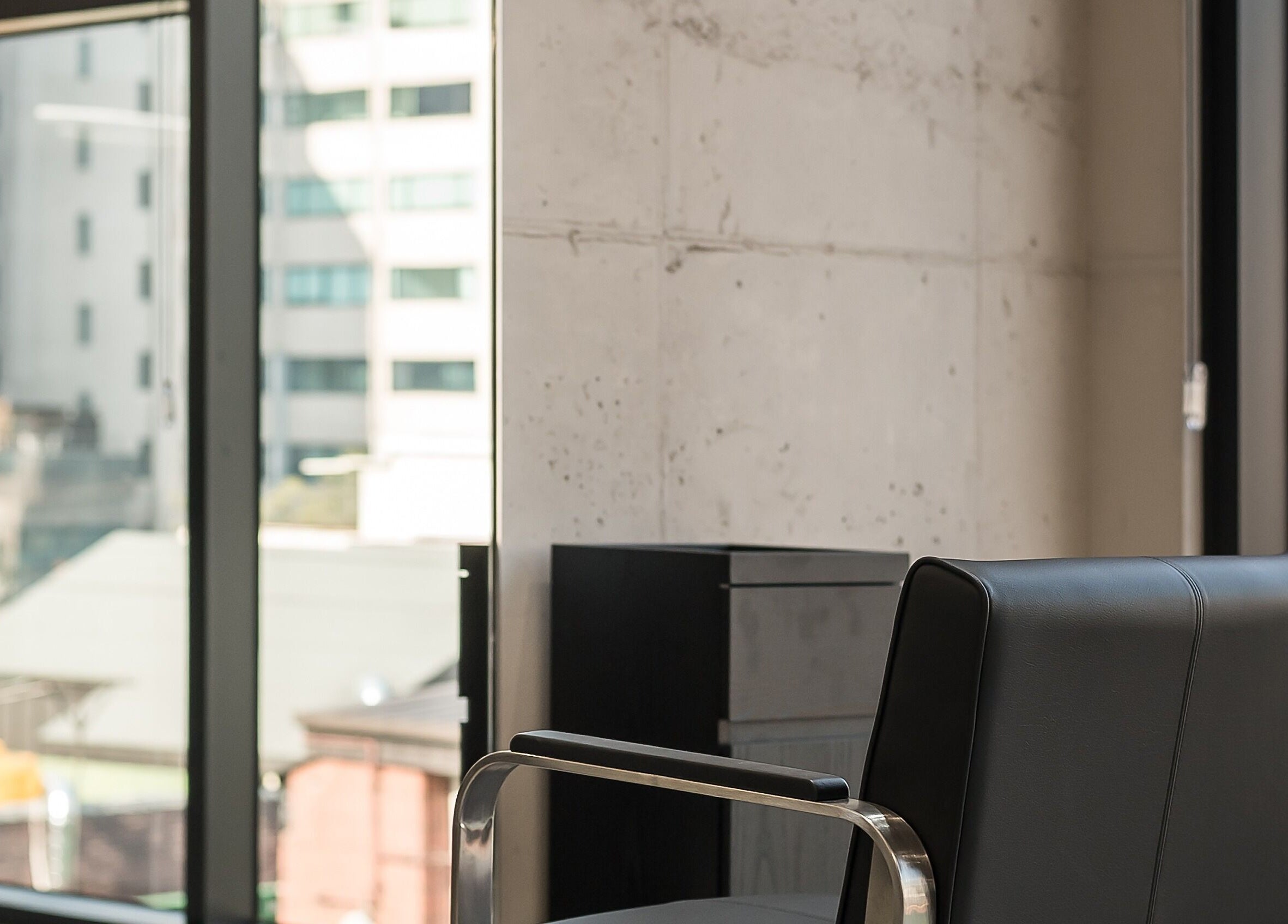 Modern salon chair at dayer in 서울특별시, 서울특별시, KR, with urban cityscape view.