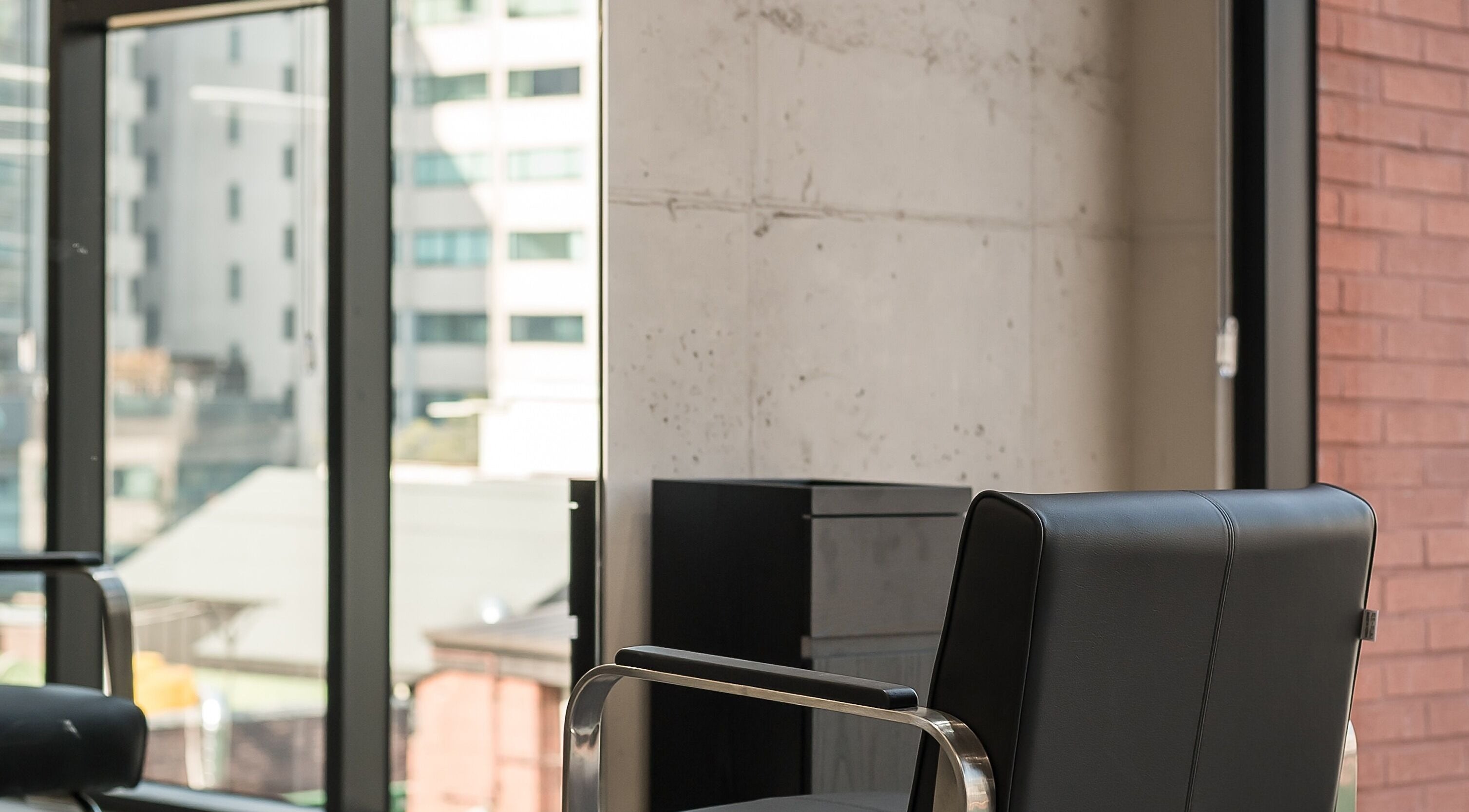 Modern salon chair at dayer in 서울특별시, 서울특별시, KR, with urban cityscape view.