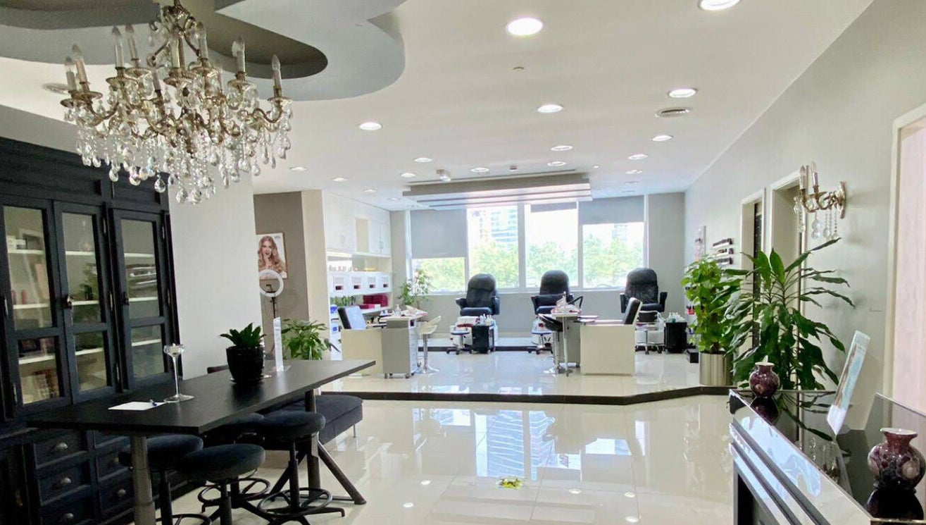 Elegant interior of The Hair Alchemist, Dubai, Dubai, AE with luxurious seating and modern decor.