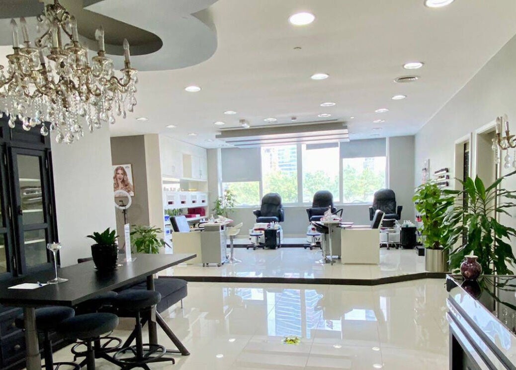 Elegant interior of The Hair Alchemist, Dubai, Dubai, AE with luxurious seating and modern decor.