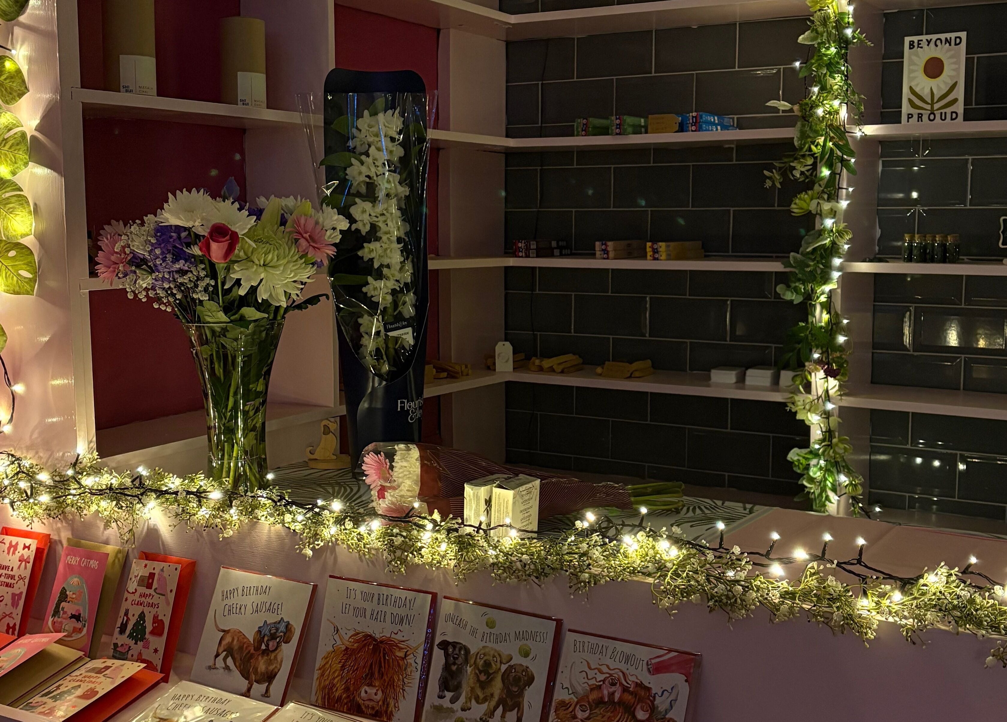 Charming interior of Beautiful Natural Spiritual in East Kilbride, Scotland, GB featuring flowers and warm lights.