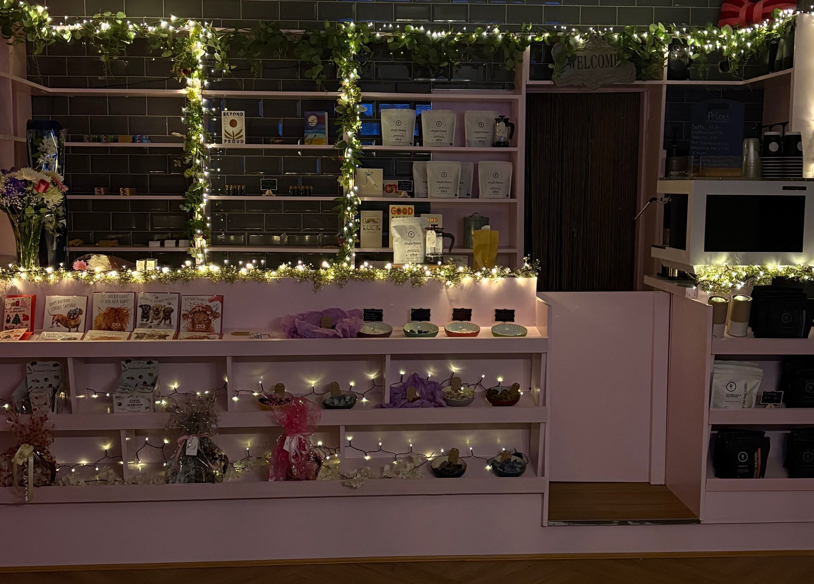 Elegant counter at Beautiful Natural Spiritual, East Kilbride, Scotland, GB, adorned with soft lights and decor.