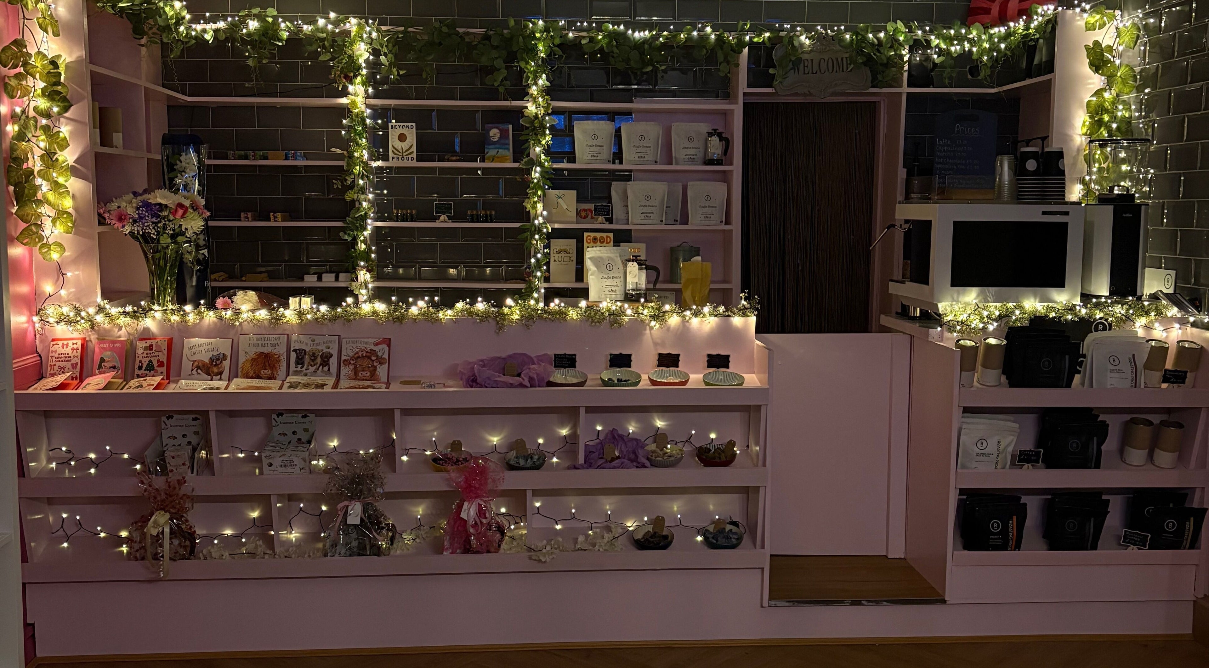 Elegant counter at Beautiful Natural Spiritual, East Kilbride, Scotland, GB, adorned with soft lights and decor.