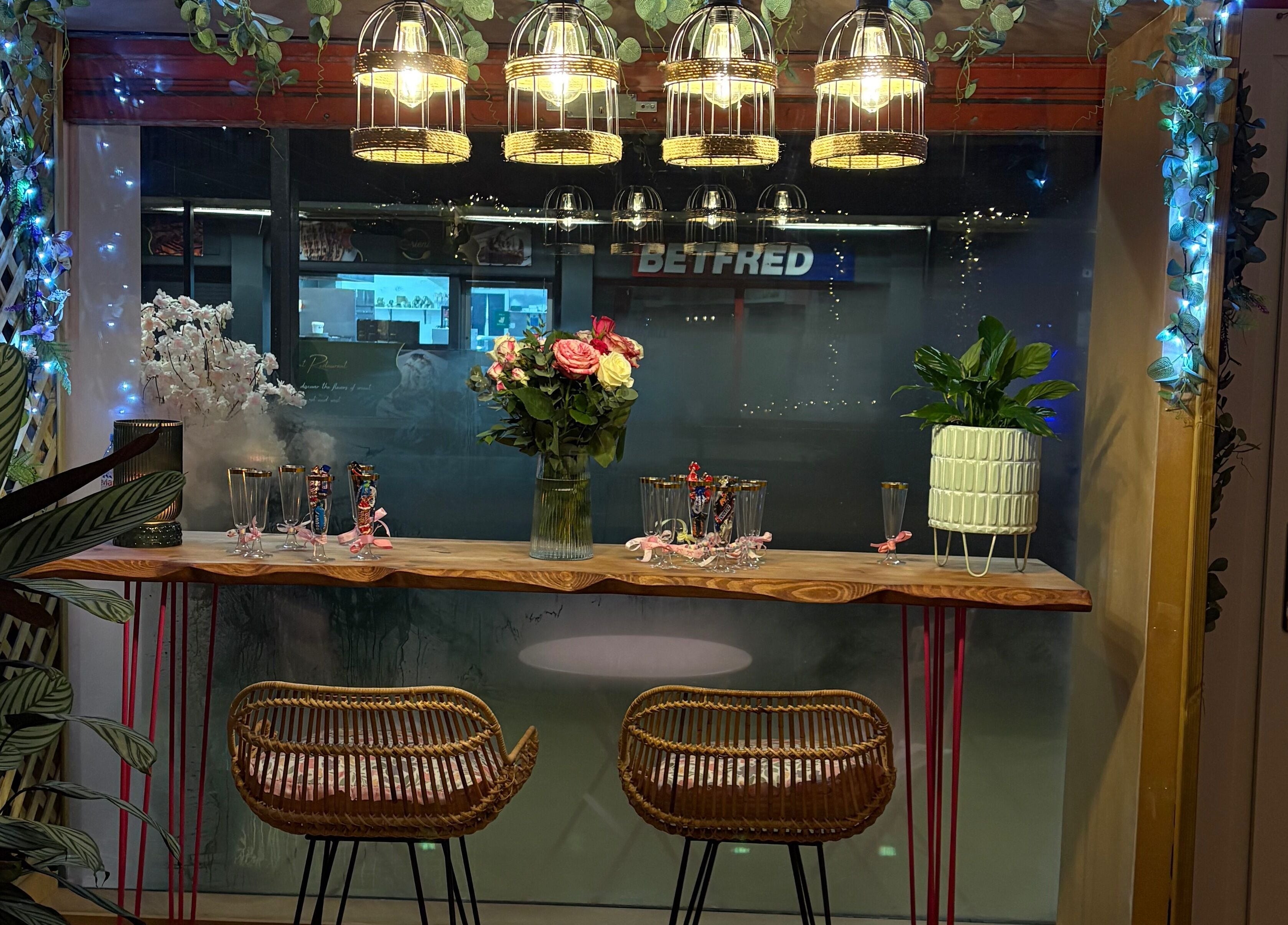 Charming table setup with flowers at Beautiful Natural Spiritual in East Kilbride, Scotland, GB.