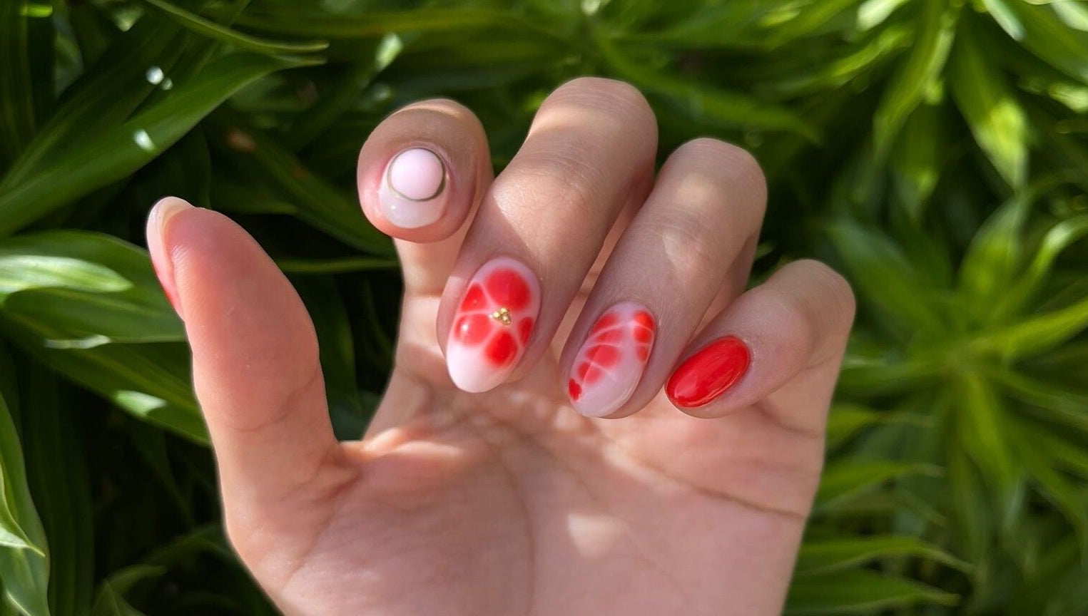 Elegant red and white floral nail art at Nailz, Guaynabo, PR, PR. Perfect blend of creativity and style.