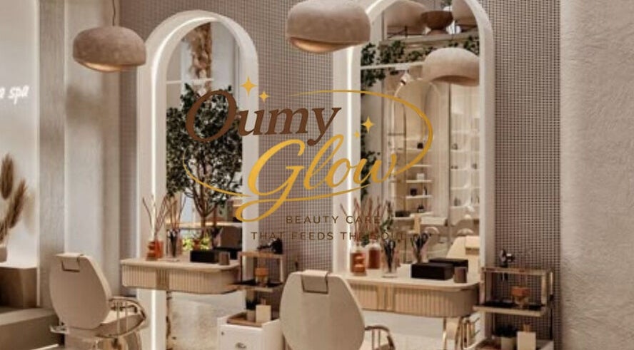 Luxurious salon interior at Oumy Glow in Pennsylvania, Pennsylvania, US, showcasing elegant decor and styling stations.