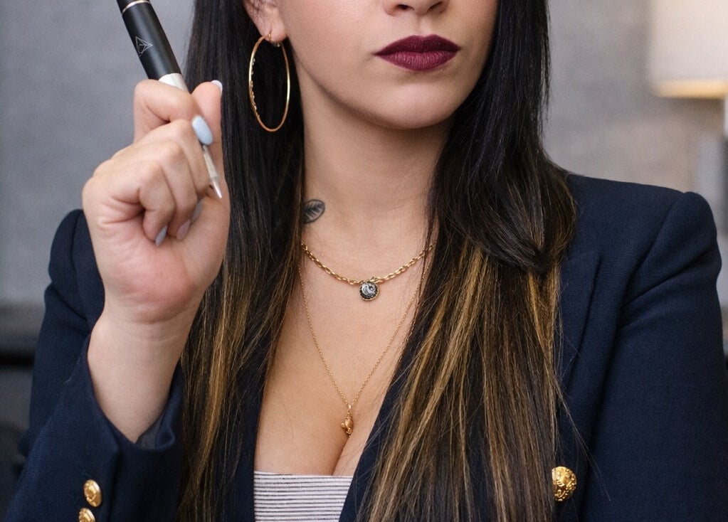 Close-up of a stylist holding a beauty tool at VIP Beauty Studio, Sherwood Park, Alberta, CA.