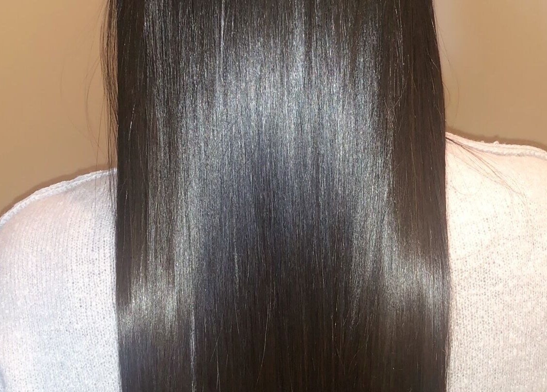 Smooth, shiny hair treatment result at VIP Beauty Studio, Sherwood Park, Alberta, CA.