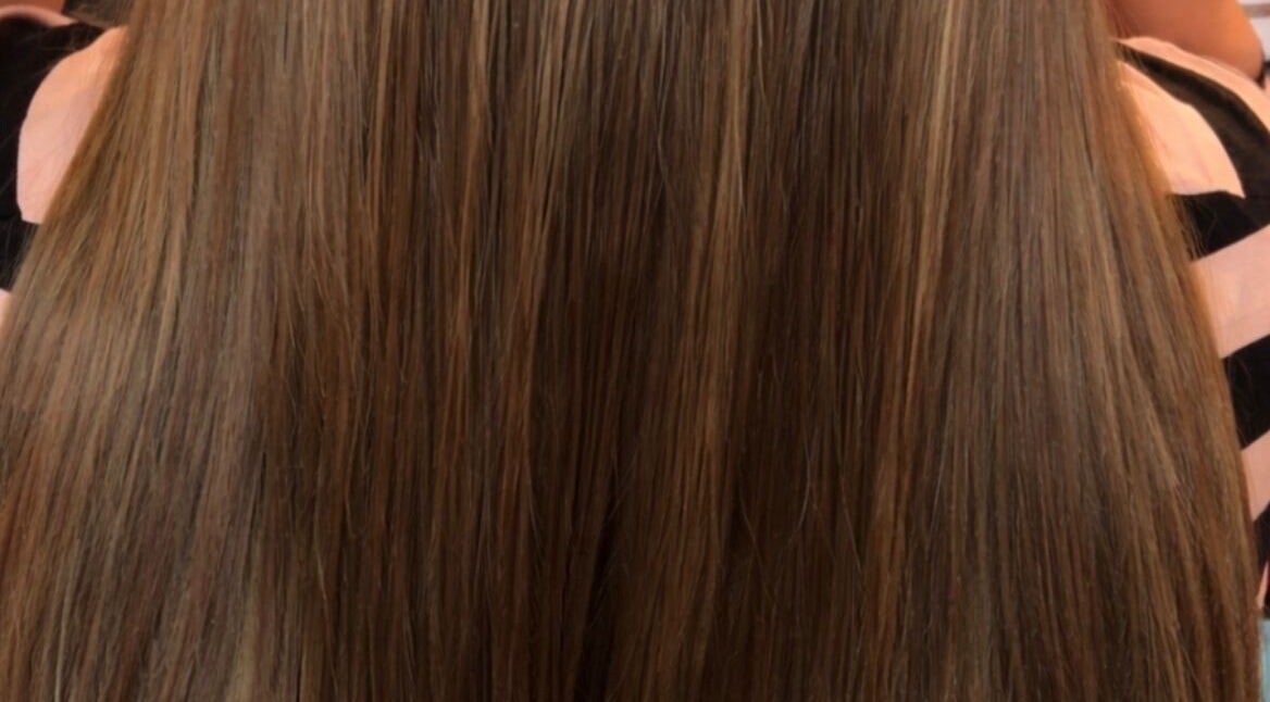 Beautiful silky brown hair styled at VIP Beauty Studio, Sherwood Park, Alberta, CA.