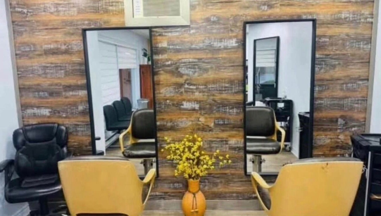 Modern salon chairs and mirrors at Industrie Beauté du Portage in Gatineau, Québec, CA.