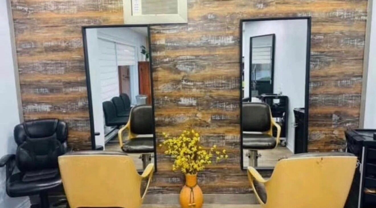 Modern salon chairs and mirrors at Industrie Beauté du Portage in Gatineau, Québec, CA.