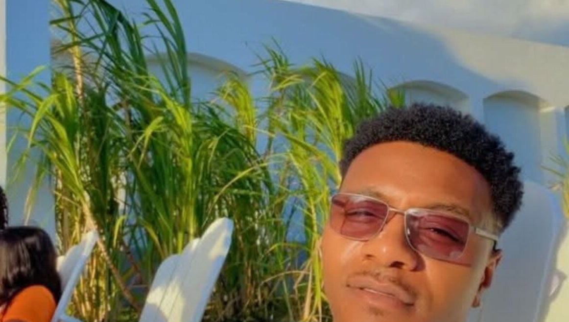 Outdoor relaxation area at Elite Kutz and Stylz LLC, Tupelo, Mississippi, US, with lush greenery and seating.