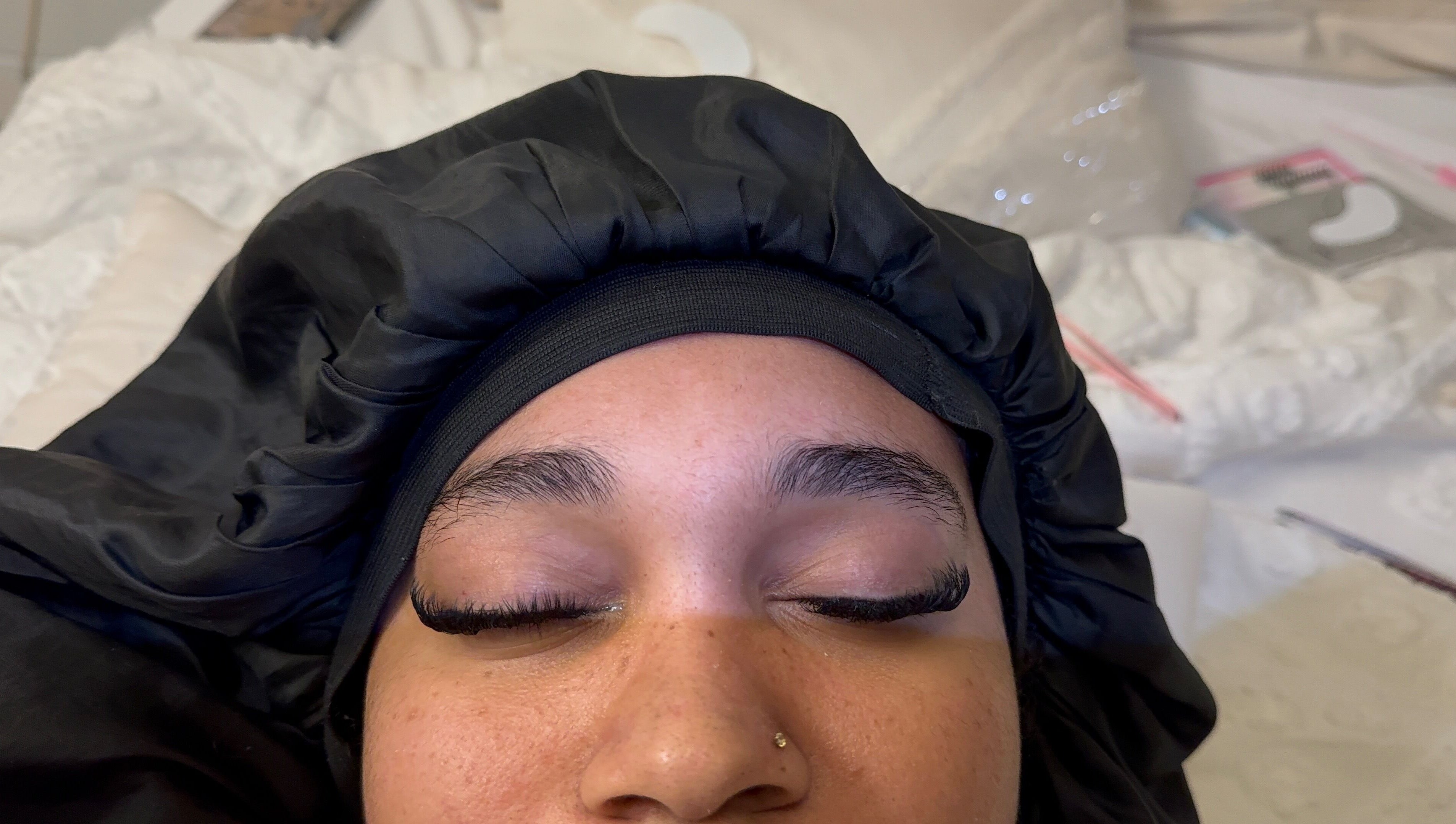 Client with newly applied lashes at Eyelashes_by_san in Greater Sudbury, Ontario, CA.