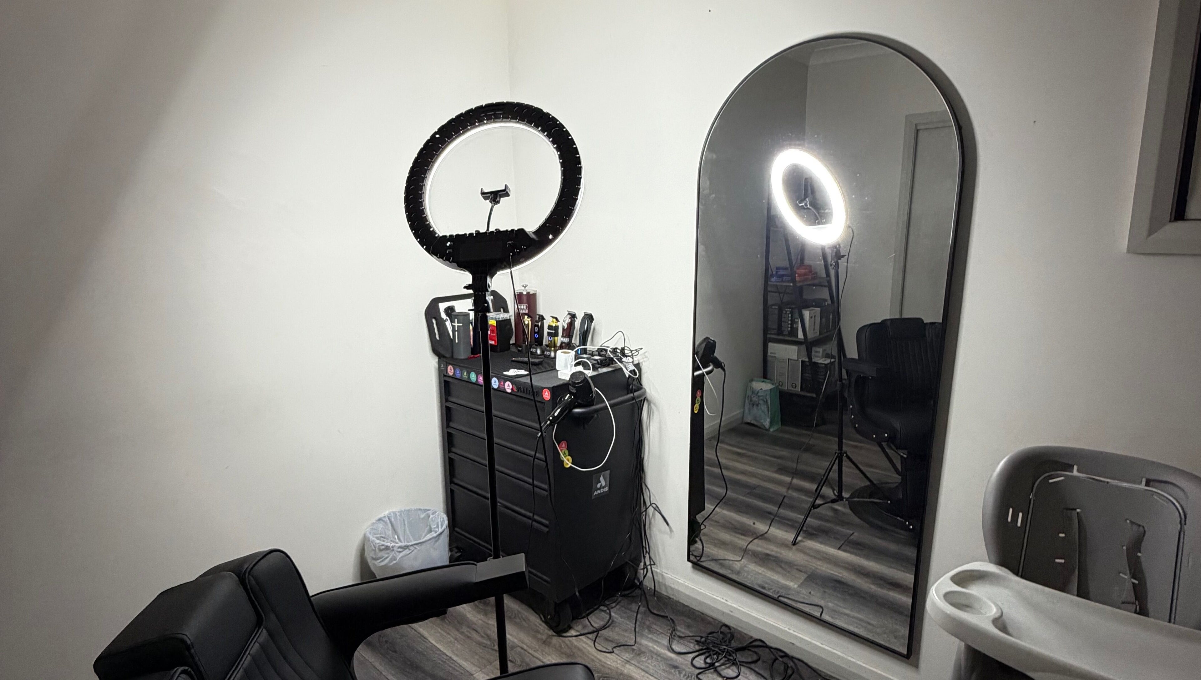 Interior of JTRIMZ salon featuring a styling chair and mirror in Guildford West, New South Wales, AU.