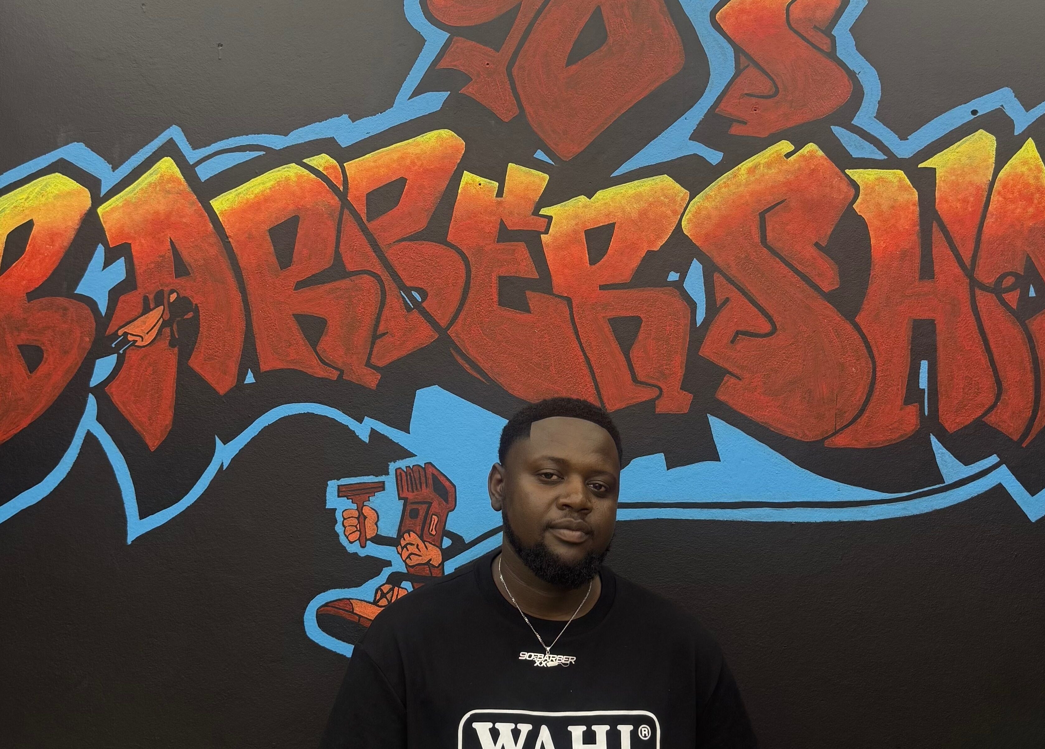 Colorful graffiti mural inside 90s barberxx shop, Middelburg, Mpumalanga, ZA.