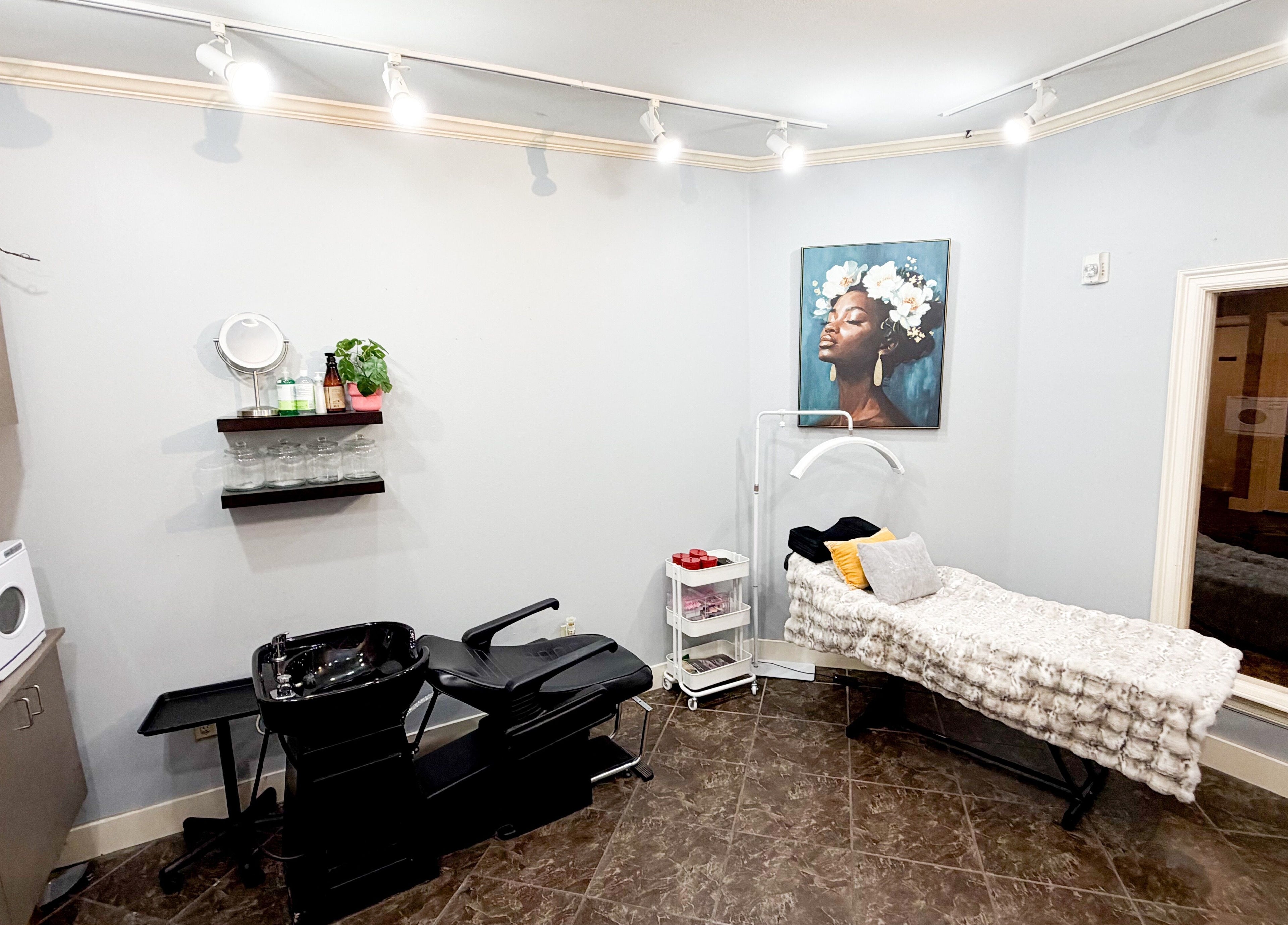 Tranquil interior of D Lounge Beauty Spa in Mckinney, Texas, US with a modern setup and elegant decor.