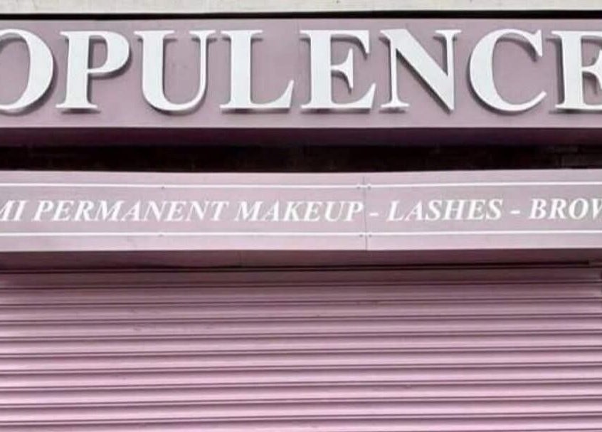 Entrance of The Healing Touch in Sunderland, England, showcasing the opulent beauty services sign.