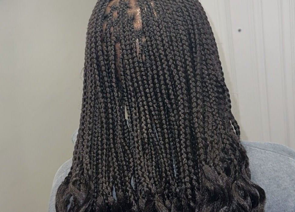 Intricate braided hairstyle at Hair & Beauty By Sandyrule, Erith, England, GB.