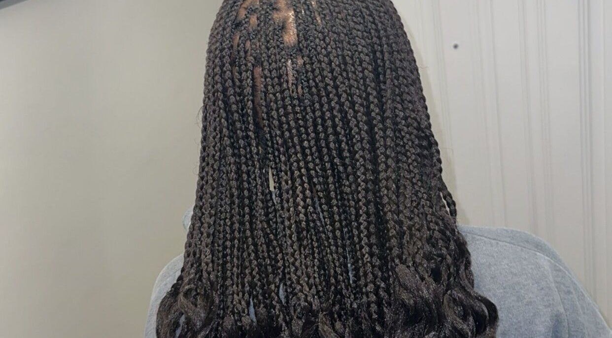 Intricate braided hairstyle at Hair & Beauty By Sandyrule, Erith, England, GB.