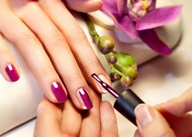 Vibrant violet manicure at Nail Matrix, Fort Erie, Ontario, CA. Perfect for a stylish, elegant look and feel.