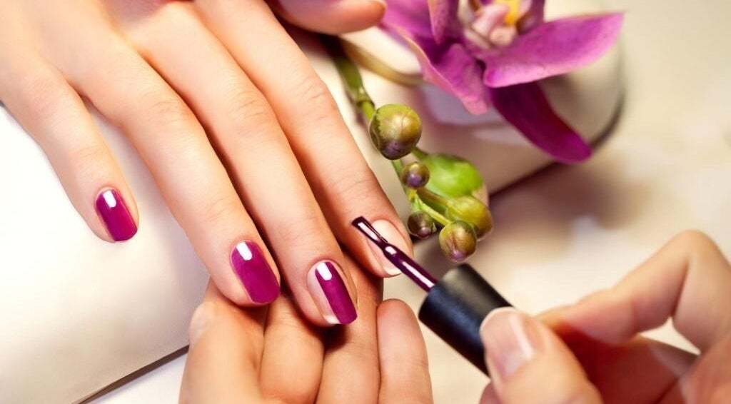 Vibrant violet manicure at Nail Matrix, Fort Erie, Ontario, CA. Perfect for a stylish, elegant look and feel.