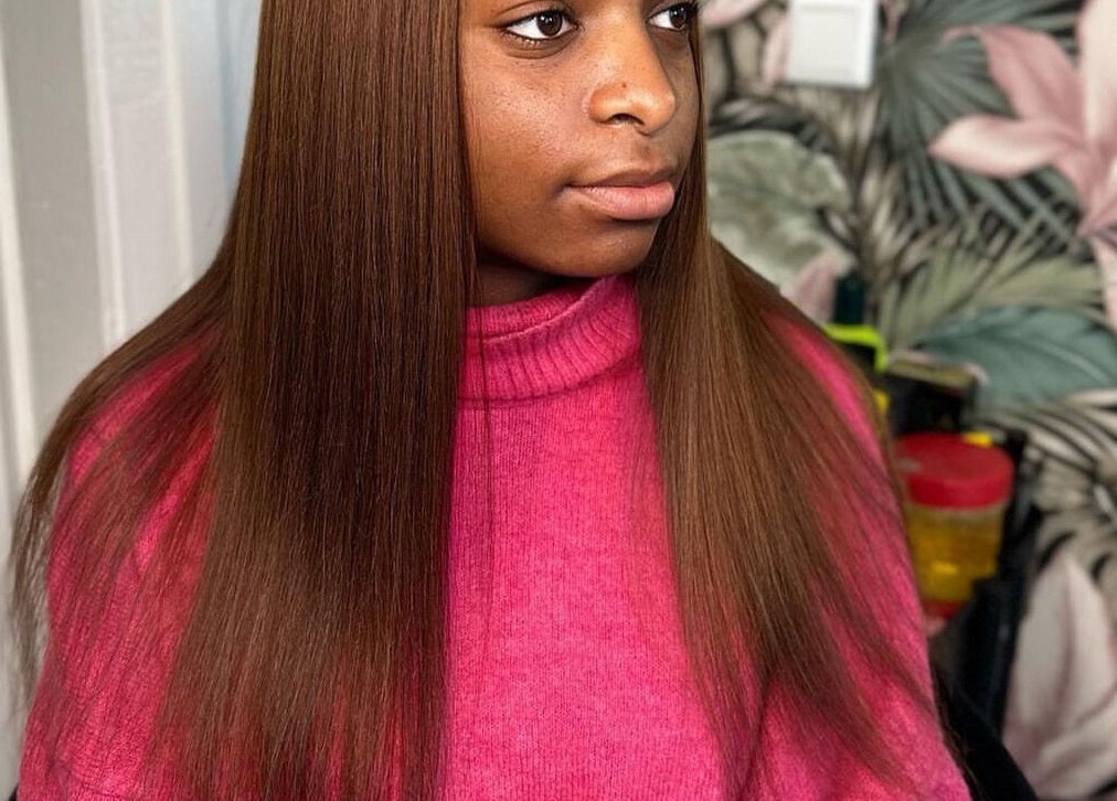 Woman with straight hair at Justslaystore, Duisburg, Nordrhein-westfalen, DE.