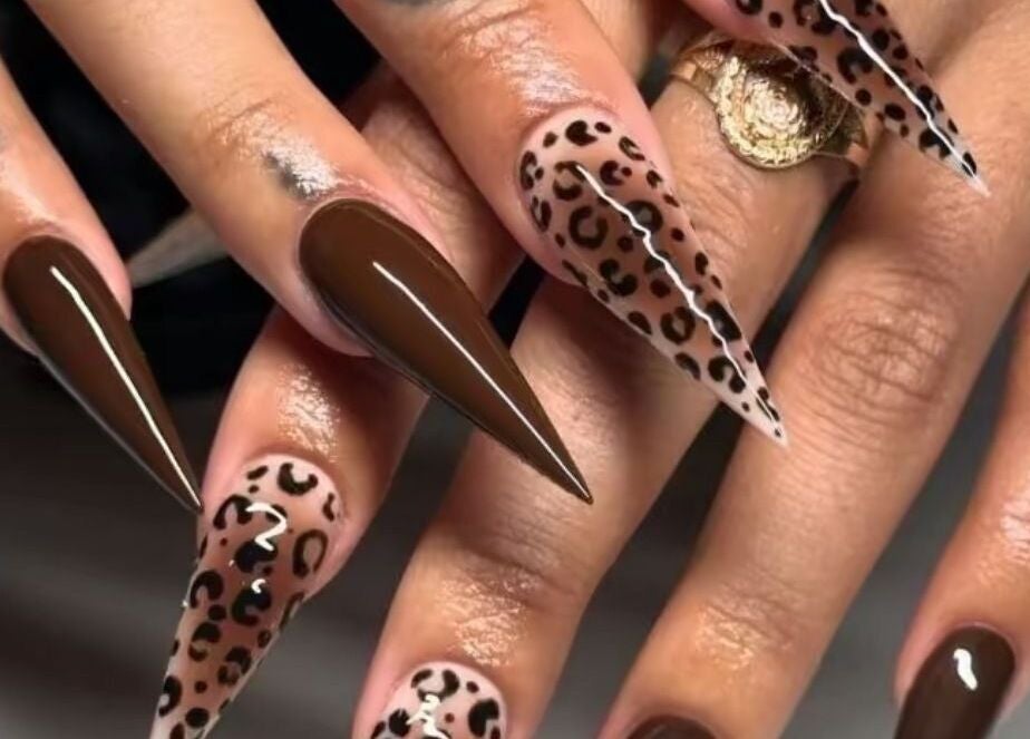 Stunning leopard print and chocolate nails at Pearl Polishes, Ekiti, Ekiti, NG.