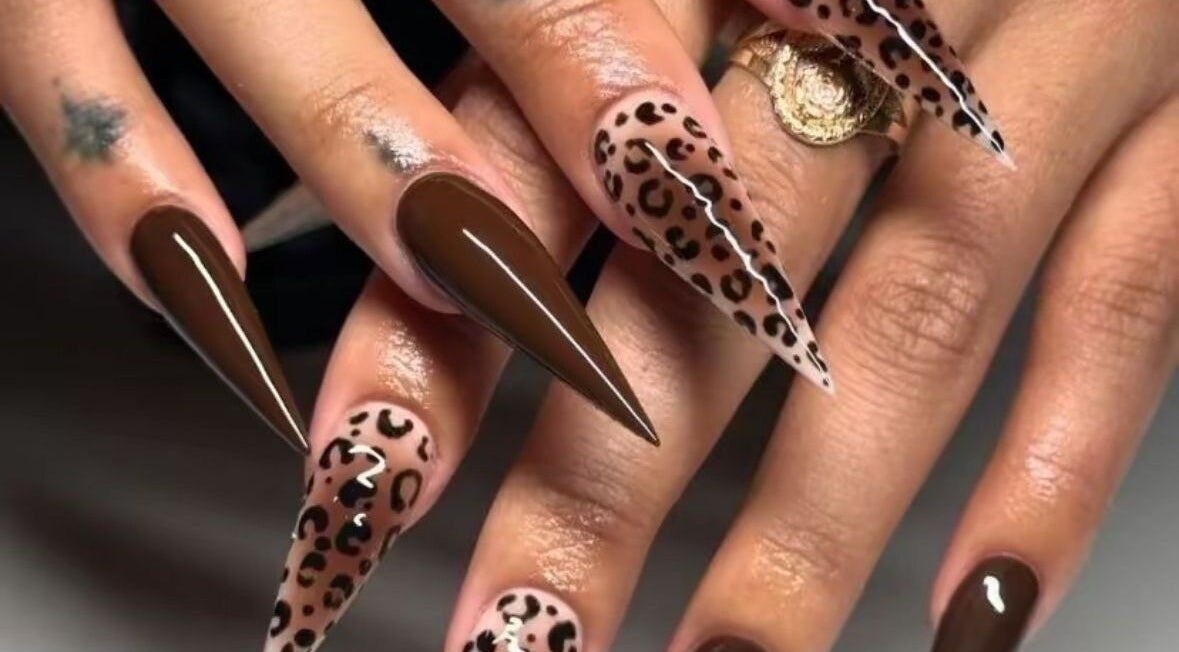 Stunning leopard print and chocolate nails at Pearl Polishes, Ekiti, Ekiti, NG.