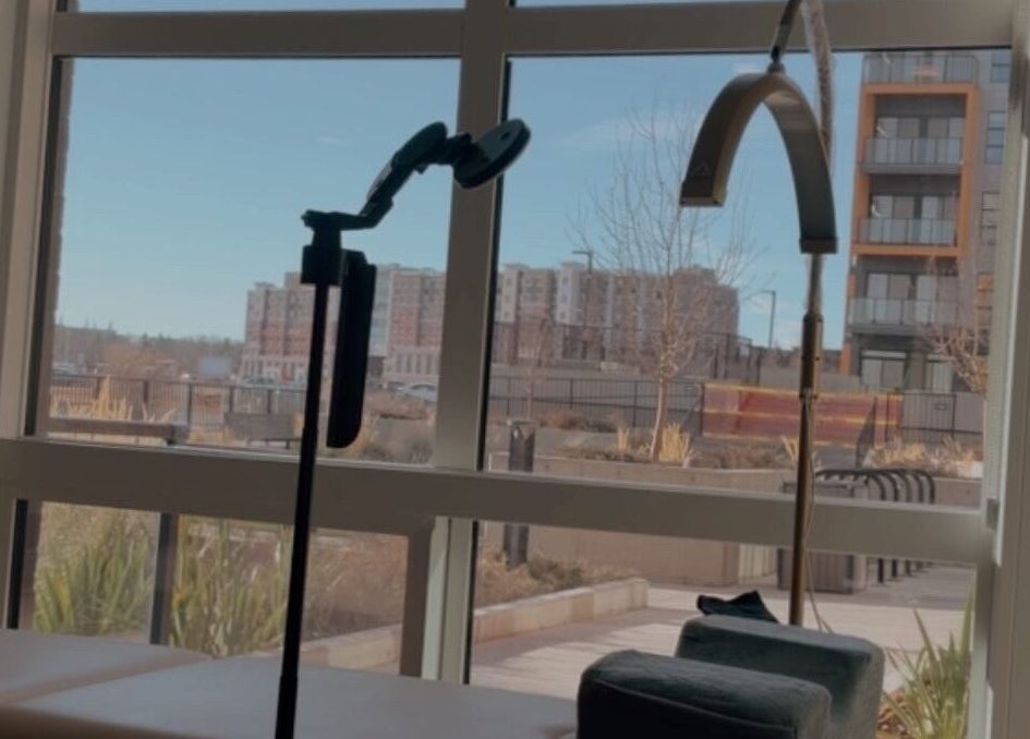 Tranquil treatment area at LASH VIBES in Calgary, Alberta, CA with a bright window view.