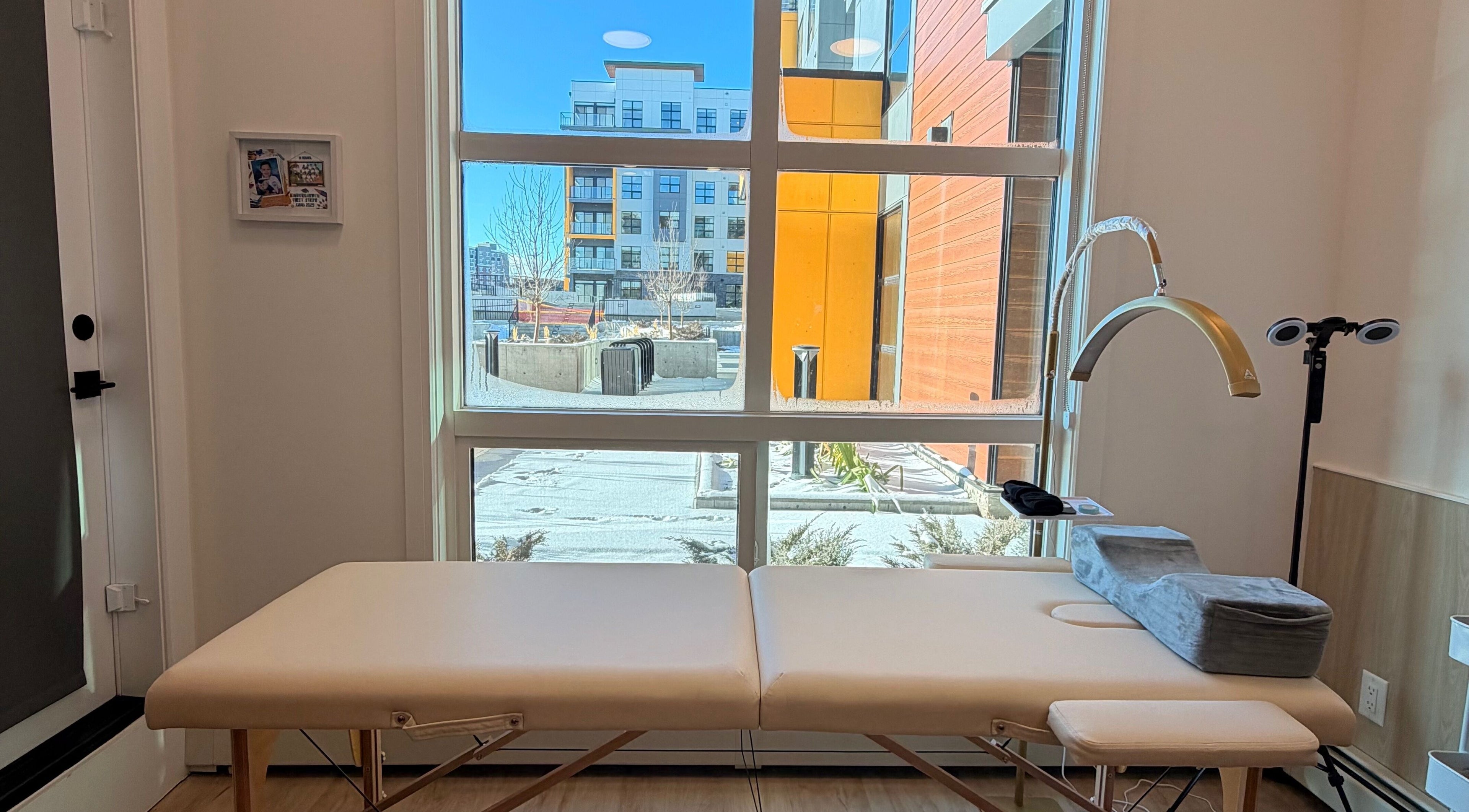 Relaxing lash treatment room at Lash Vibes, Calgary, Alberta, CA, with natural lighting and modern decor.