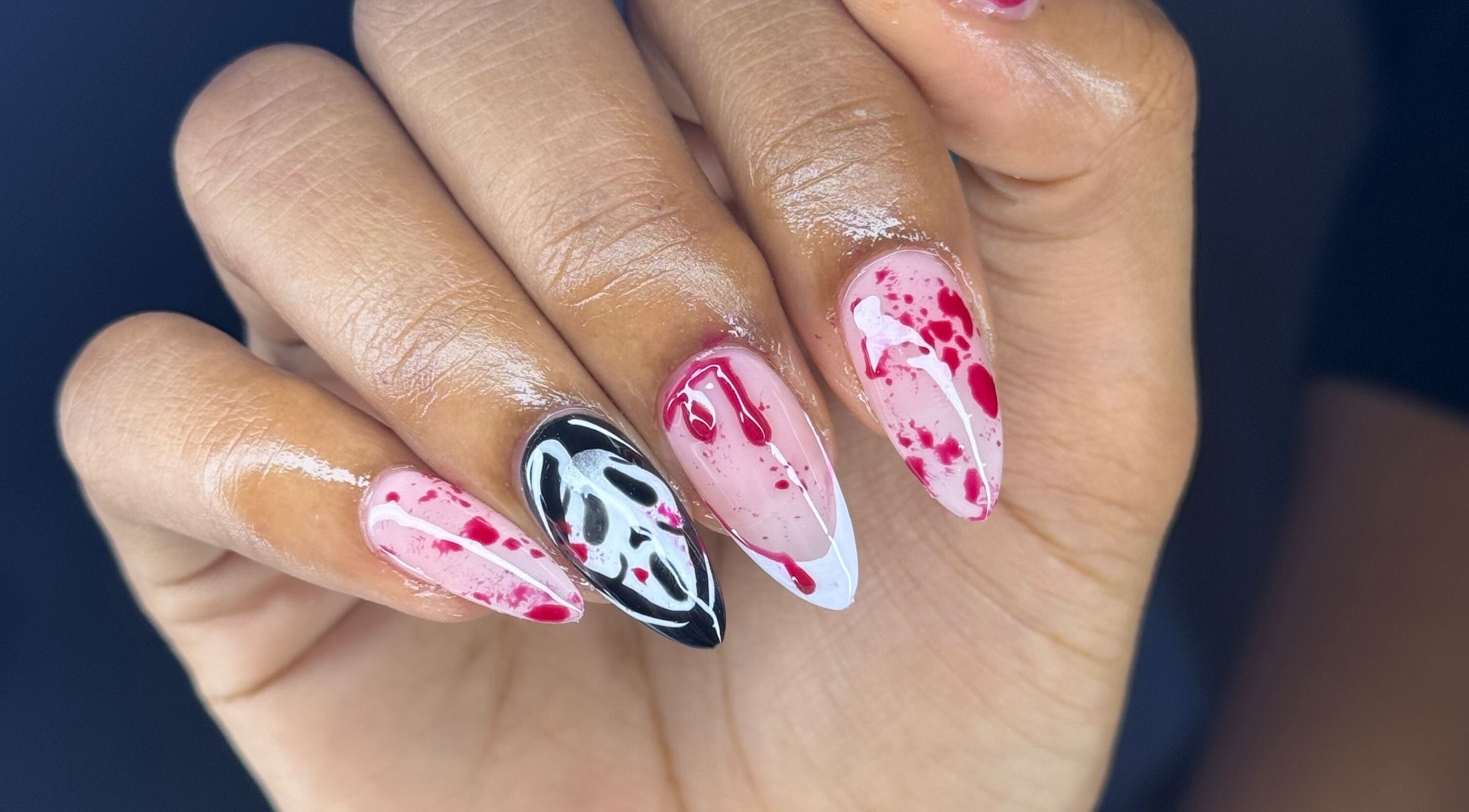 Creative nail art with red and black accents at Nailashed.sr, Paramaribo, Paramaribo, SR.