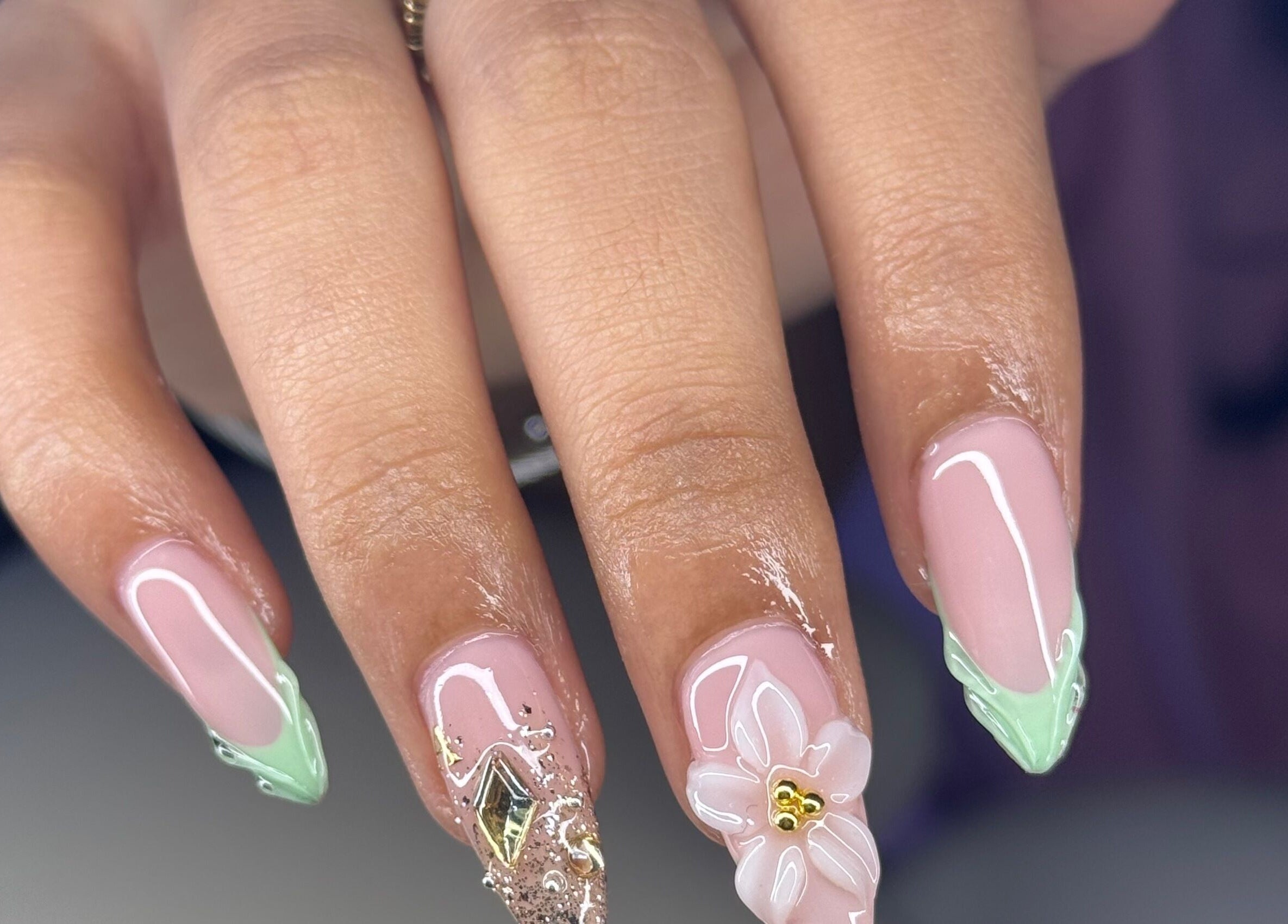 Elegant floral and gem-accented nails at Nailashed.sr, Paramaribo, Paramaribo, SR.