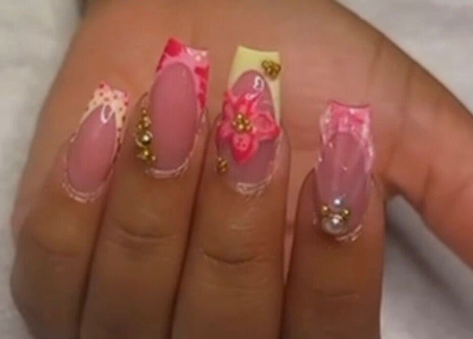 Elegant floral nail art with pearls at Red Cutex, Saint George, Saint George, BB.