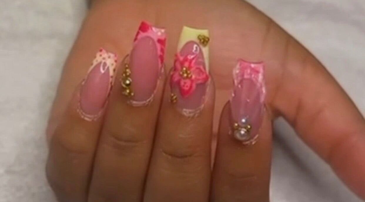 Elegant floral nail art with pearls at Red Cutex, Saint George, Saint George, BB.