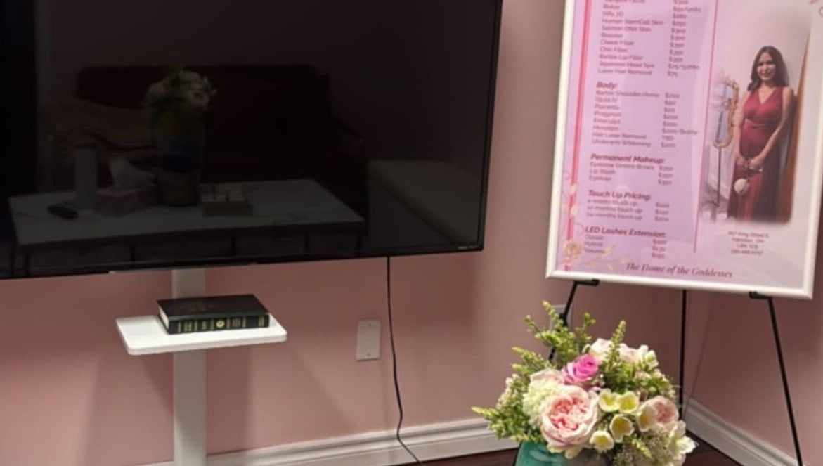 Floral arrangement and services board at Dyosa Beauty and Wellness Lounge, Hamilton, Ontario, CA.