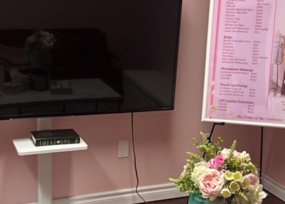 Floral arrangement and services board at Dyosa Beauty and Wellness Lounge, Hamilton, Ontario, CA.