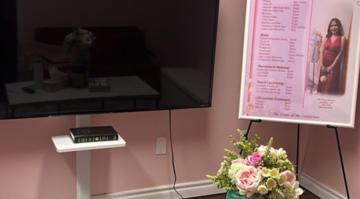 Floral arrangement and services board at Dyosa Beauty and Wellness Lounge, Hamilton, Ontario, CA.
