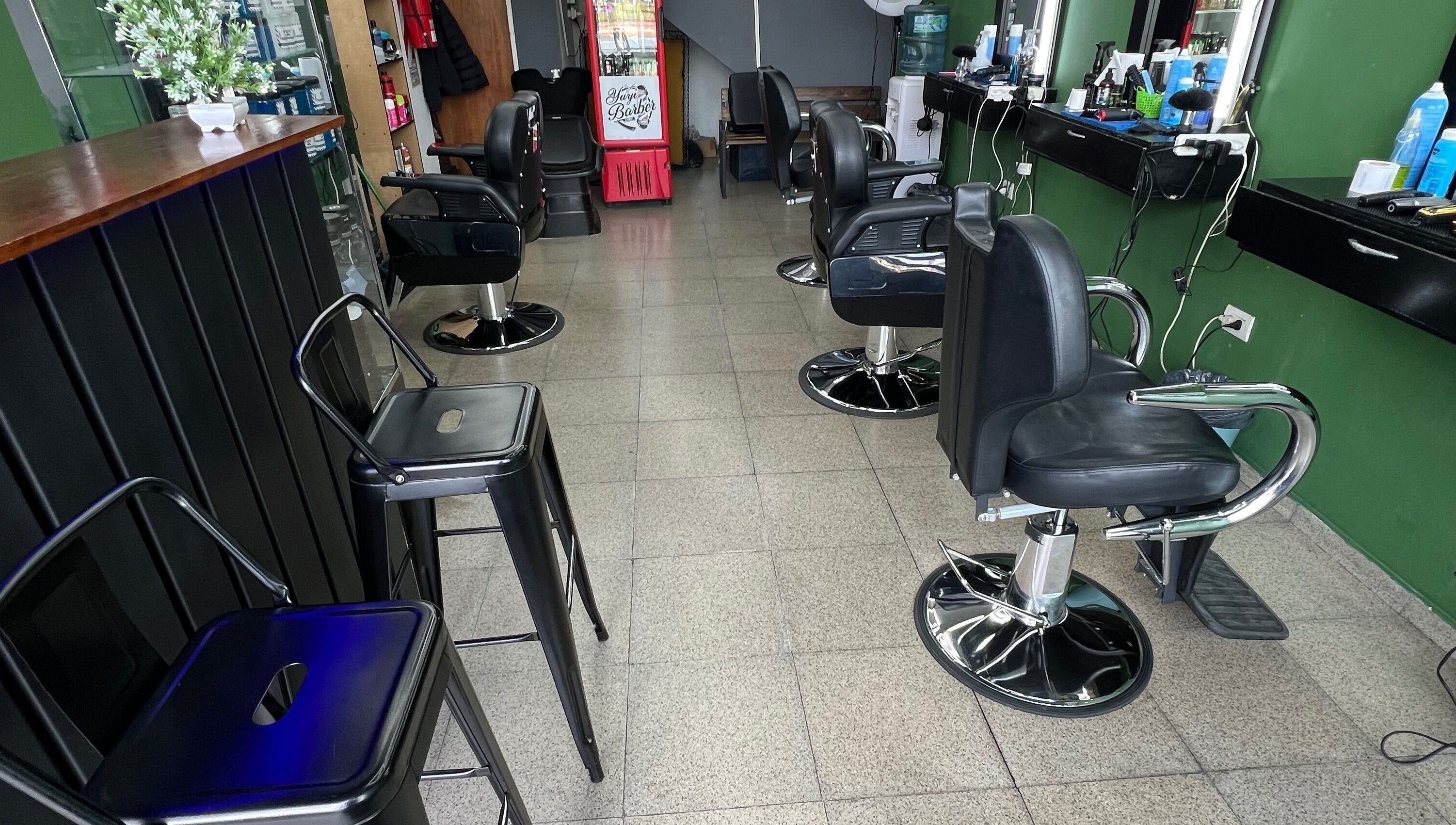 Modern barber chairs at Yuyi Barber, Lomas Del Mirador, Provincia De Buenos Aires, AR. Chic interior design.