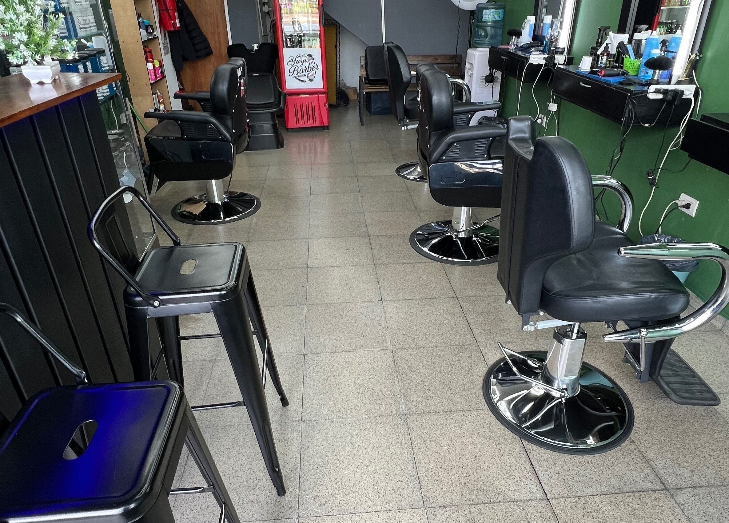 Modern barber chairs at Yuyi Barber, Lomas Del Mirador, Provincia De Buenos Aires, AR. Chic interior design.