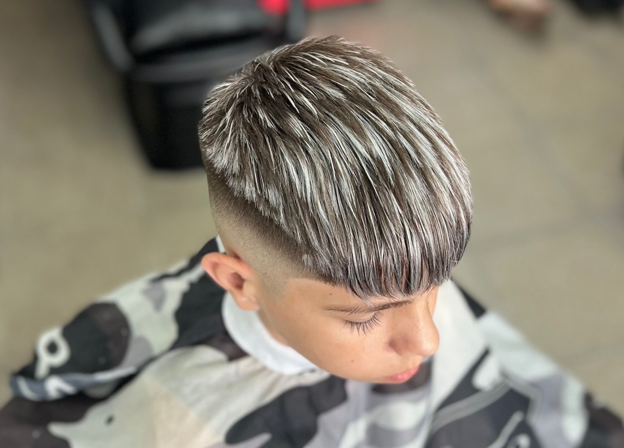 Top view of stylish haircut at Yuyi baber in Lomas Del Mirador, Provincia De Buenos Aires, AR.