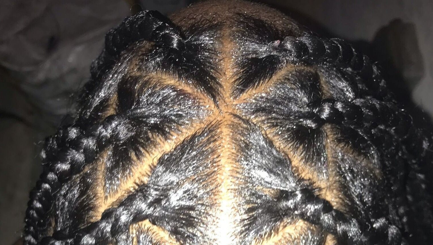 Close-up of intricate braids at The Naï Effect, Saint Thomas, Saint Thomas, BB showcasing expert hair design.
