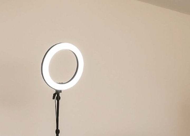 Professional ring light setup at Enhance Studio, Leeds, England, GB, perfect for beauty services.