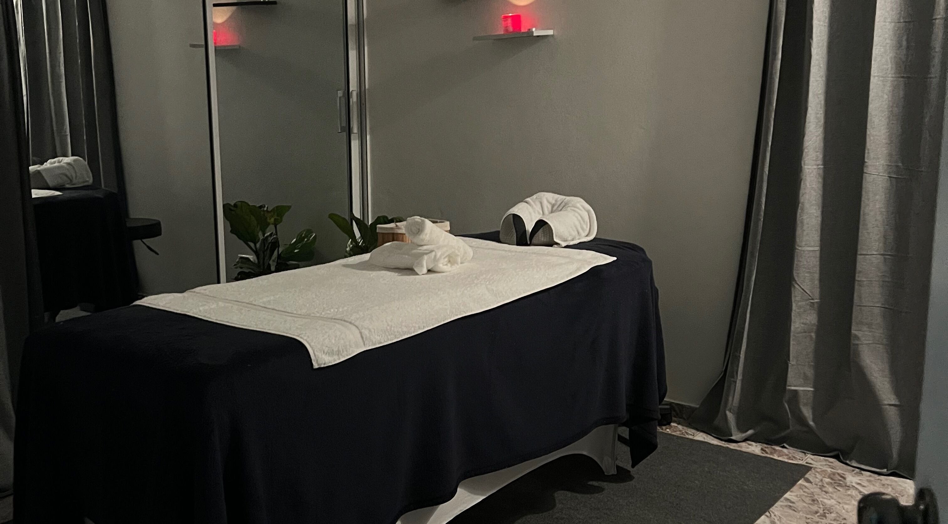 Tranquil massage room at Caya Spa, Santiago De Los Caballeros, Santiago, DO, featuring a cozy massage table.