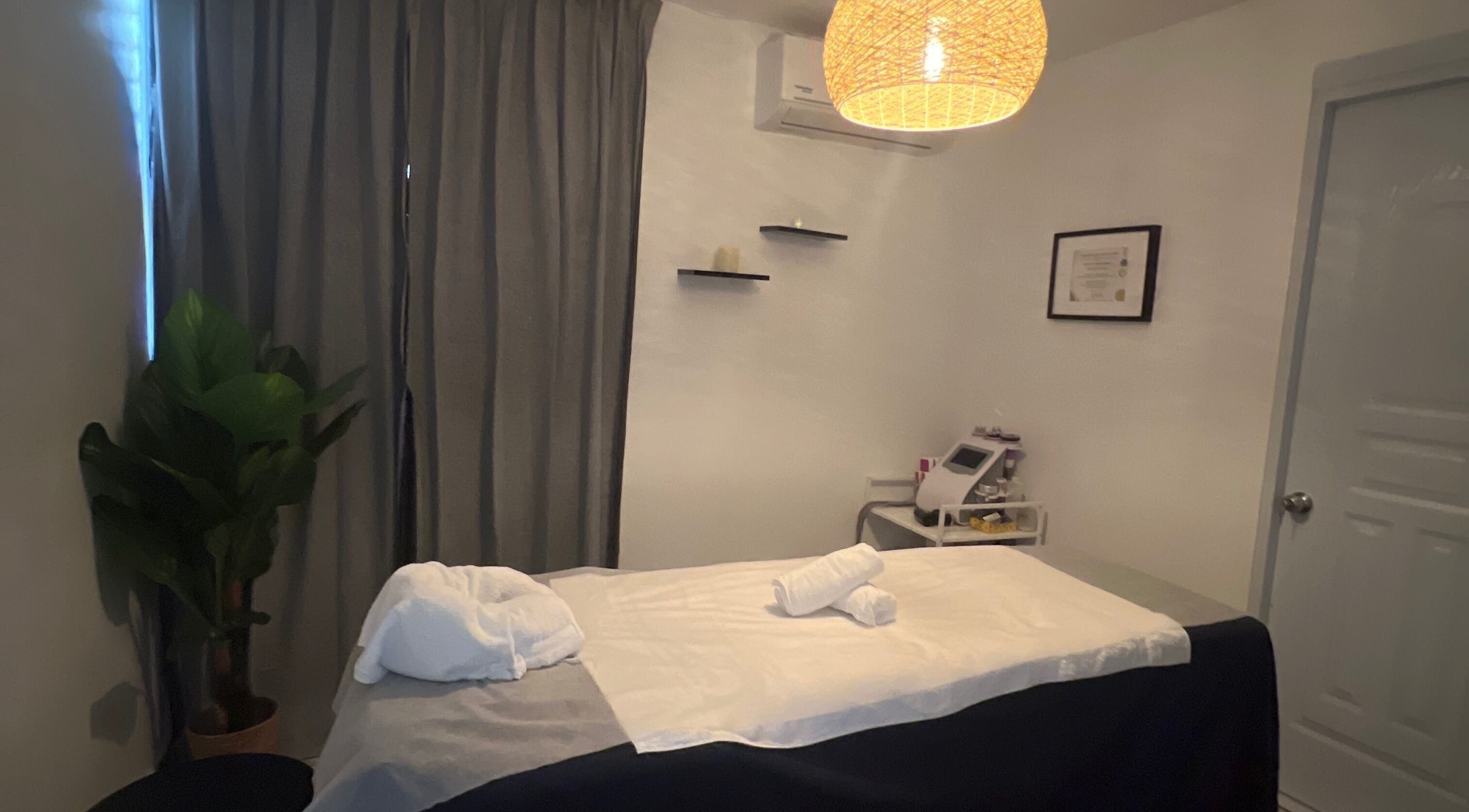 Peaceful massage room at Caya Spa, Santiago De Los Caballeros, Santiago, DO, with calming decor.