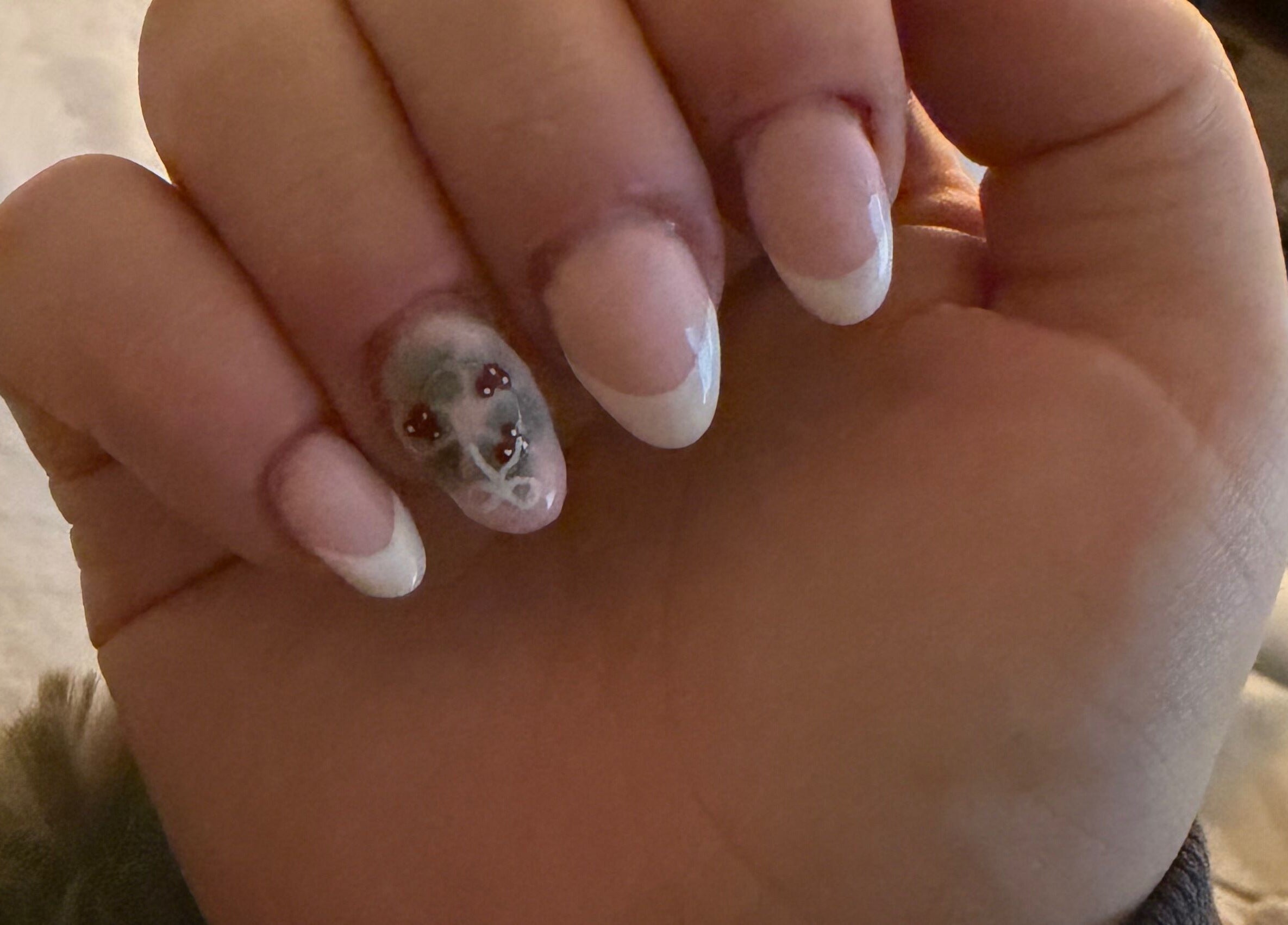 Elegant nail design by KNailedItxx in Aberdour, Scotland, GB, featuring pink and white tips with floral art.