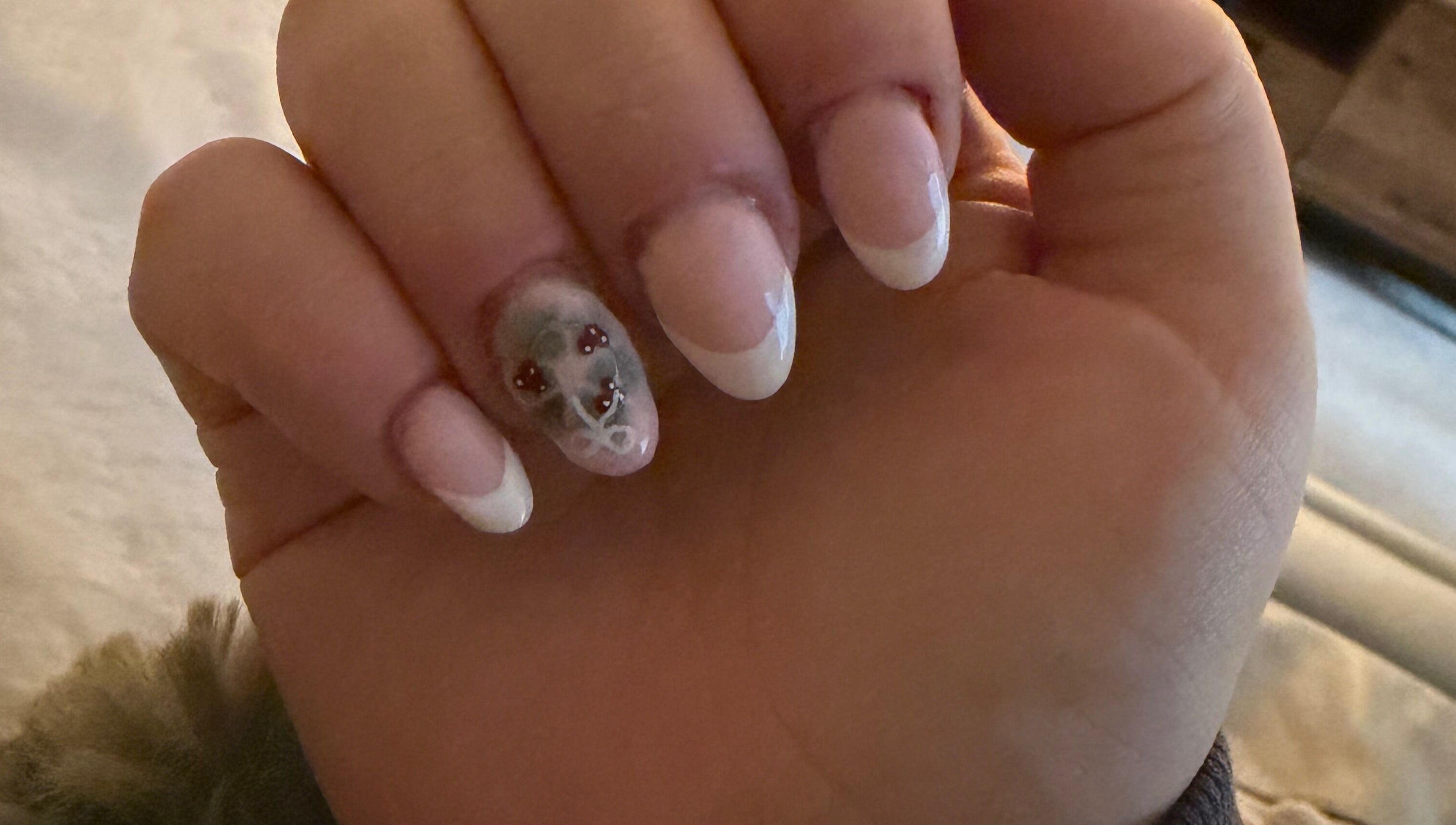 Elegant nail art at KNailedItxx in Inverkeithing, Scotland, GB featuring classic French tips.