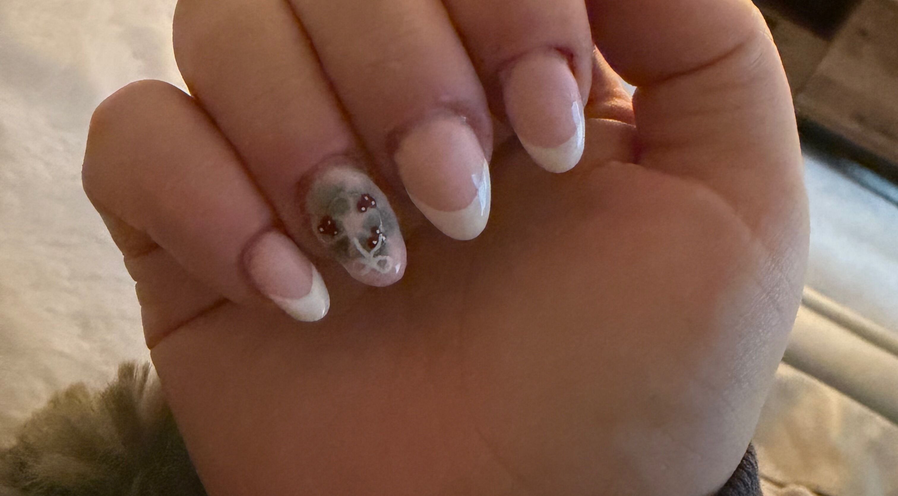 Elegant nail art at KNailedItxx in Inverkeithing, Scotland, GB featuring classic French tips.