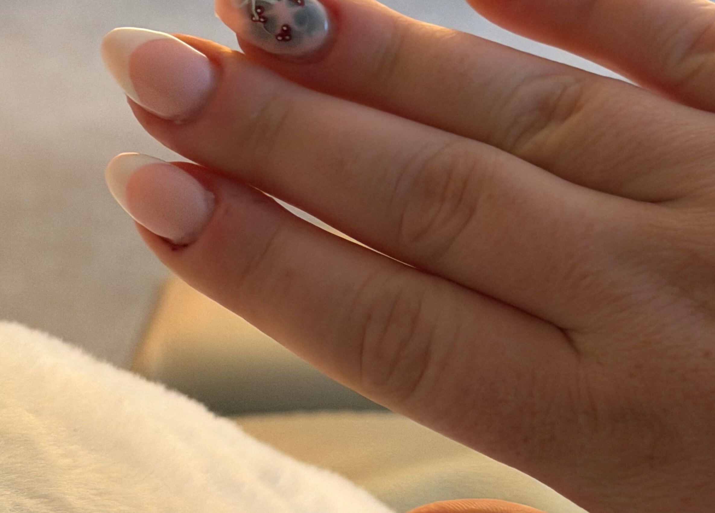 Elegant nail art at Knaileditxx, Inverkeithing, Scotland, GB featuring pink and floral accents.