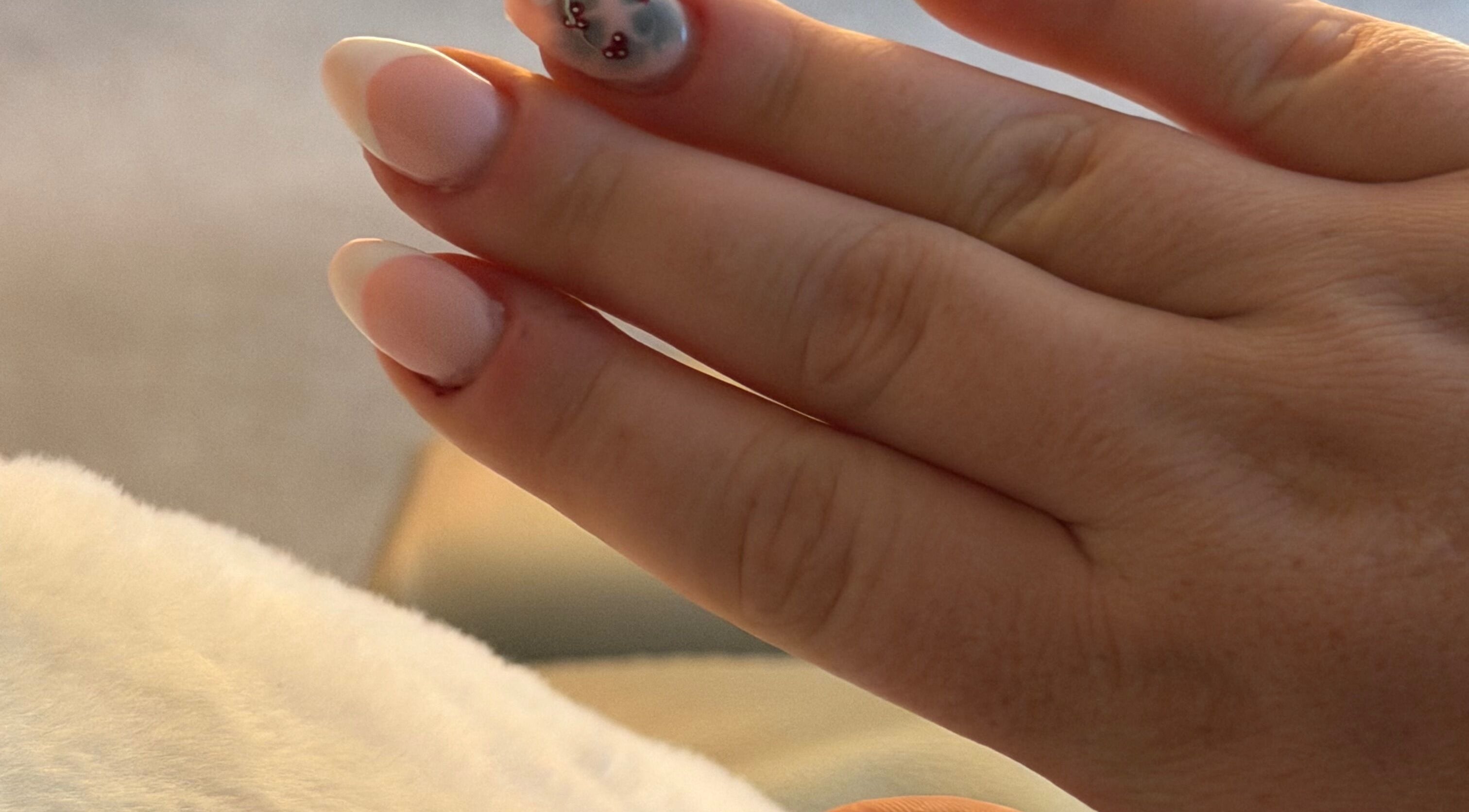 Elegant nail art at Knaileditxx, Inverkeithing, Scotland, GB featuring pink and floral accents.